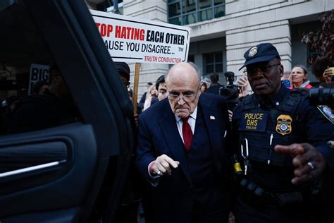 Two Georgia poll workers sue One America News, Giuliani over 